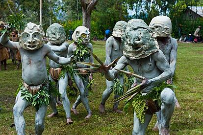Colorful dressed and face painted local tribes celebrating the traditional Sing Sing in Paya in the Highlands of Papua New Guinea